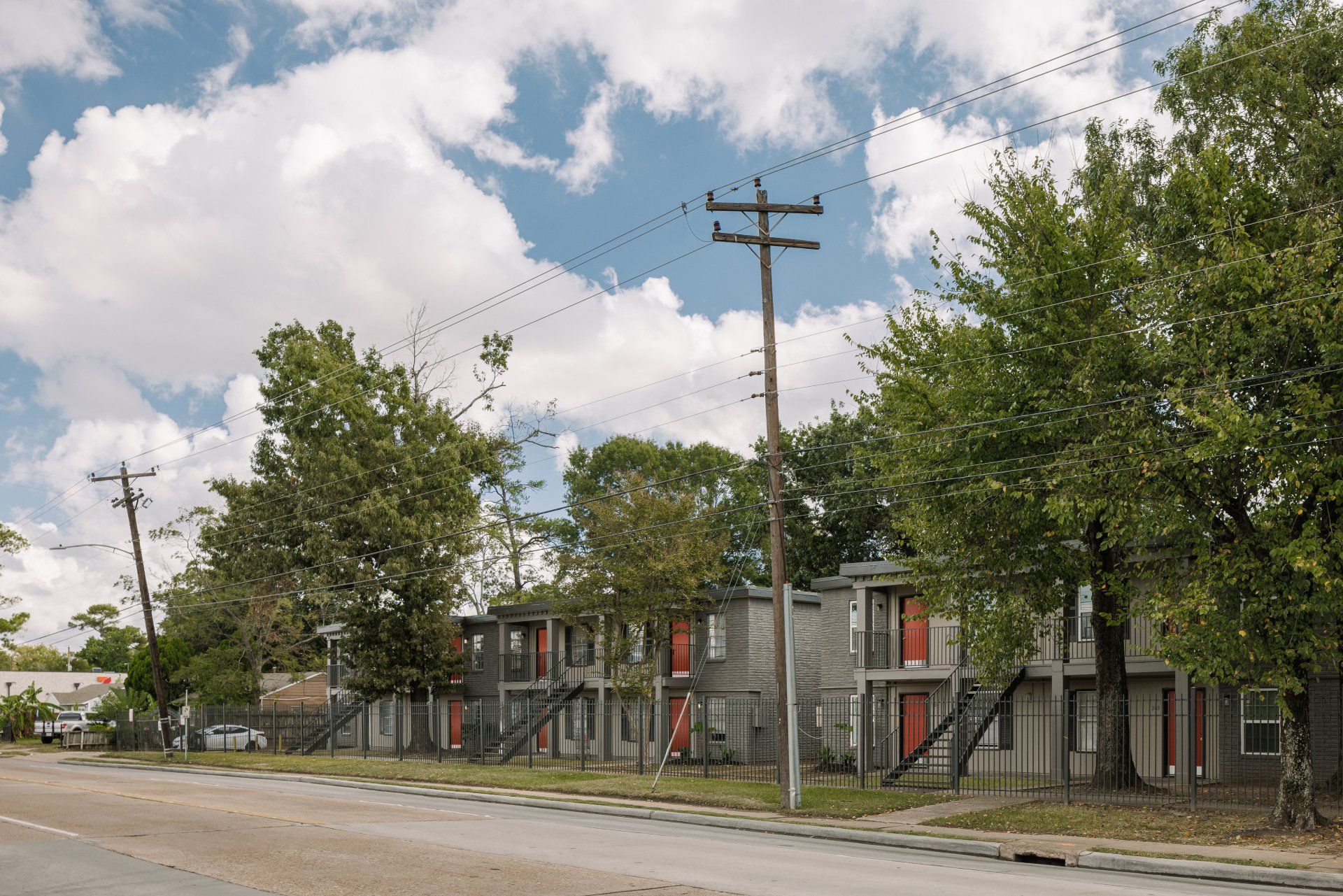 Gia Memorial modern Houston apartments with red doors, for rent.