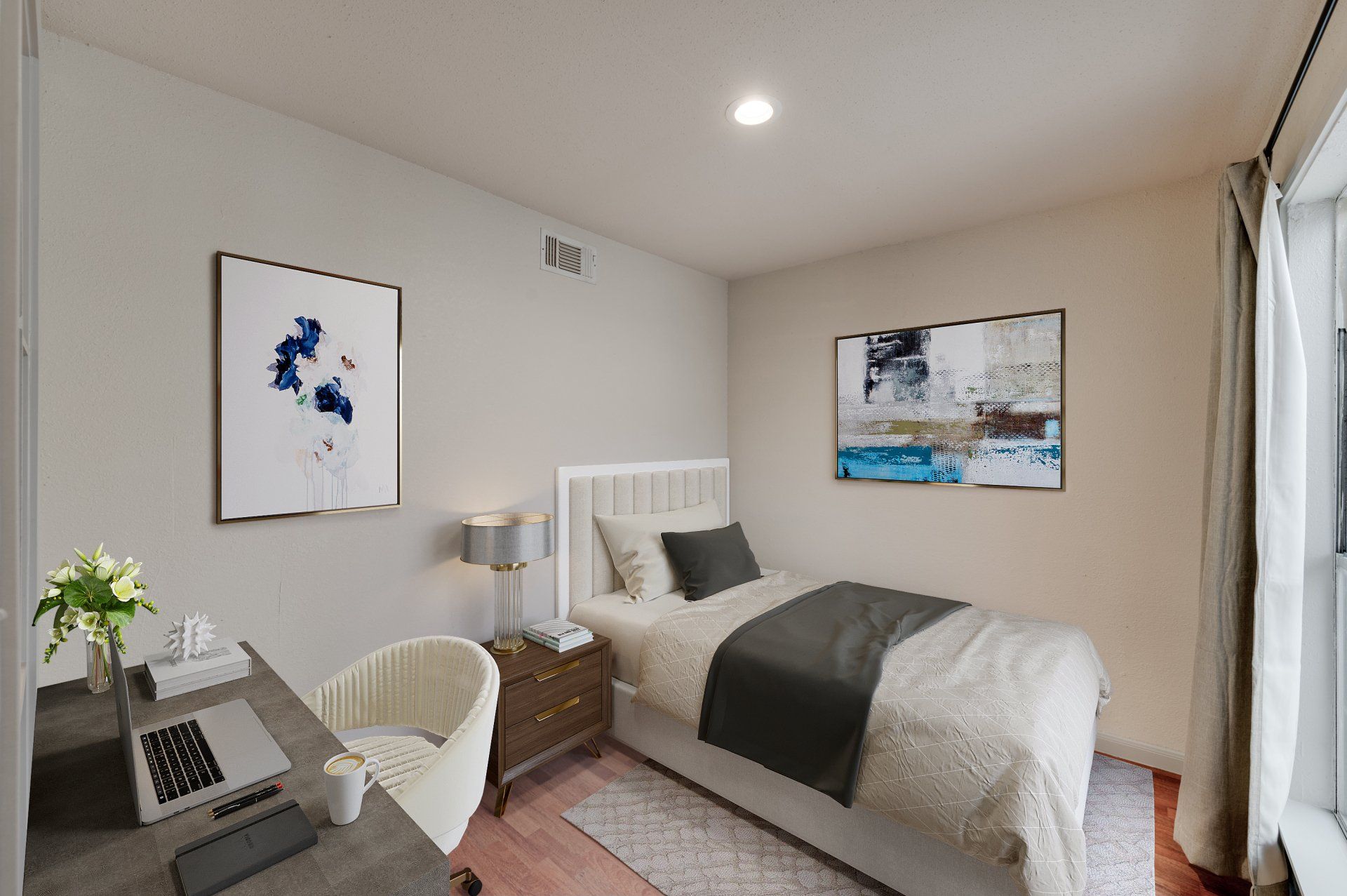 Modern bedroom at GIA Westchase with dedicated workspace, ideal for Houston apartments in Westchase District.