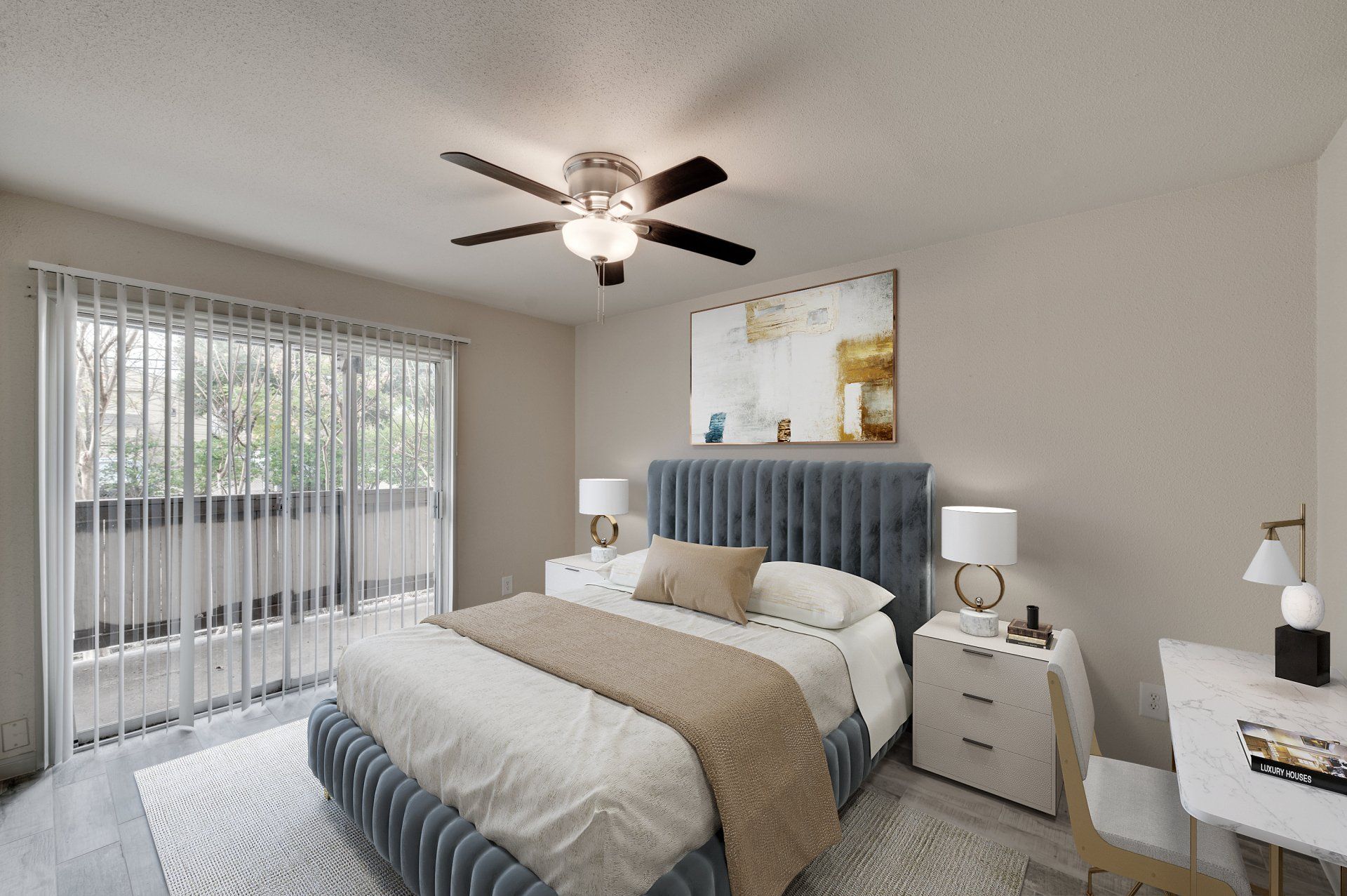 Modern bedroom at GIA Westchase with balcony and ceiling fan, showcasing Westchase District Houston apartments.