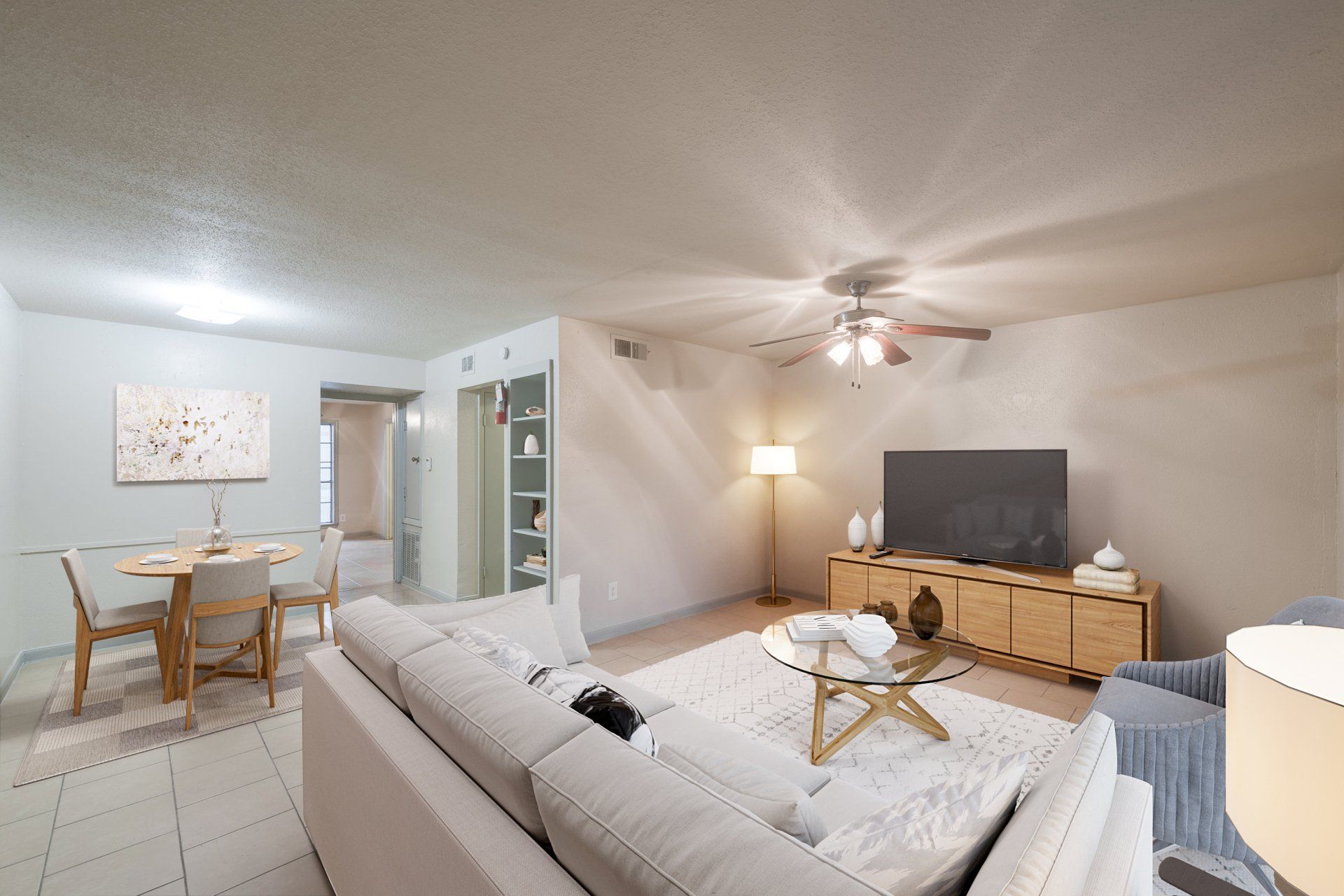 Experience modern Houston apartment living in this stylishly furnished living room, ready for you to make it your own.