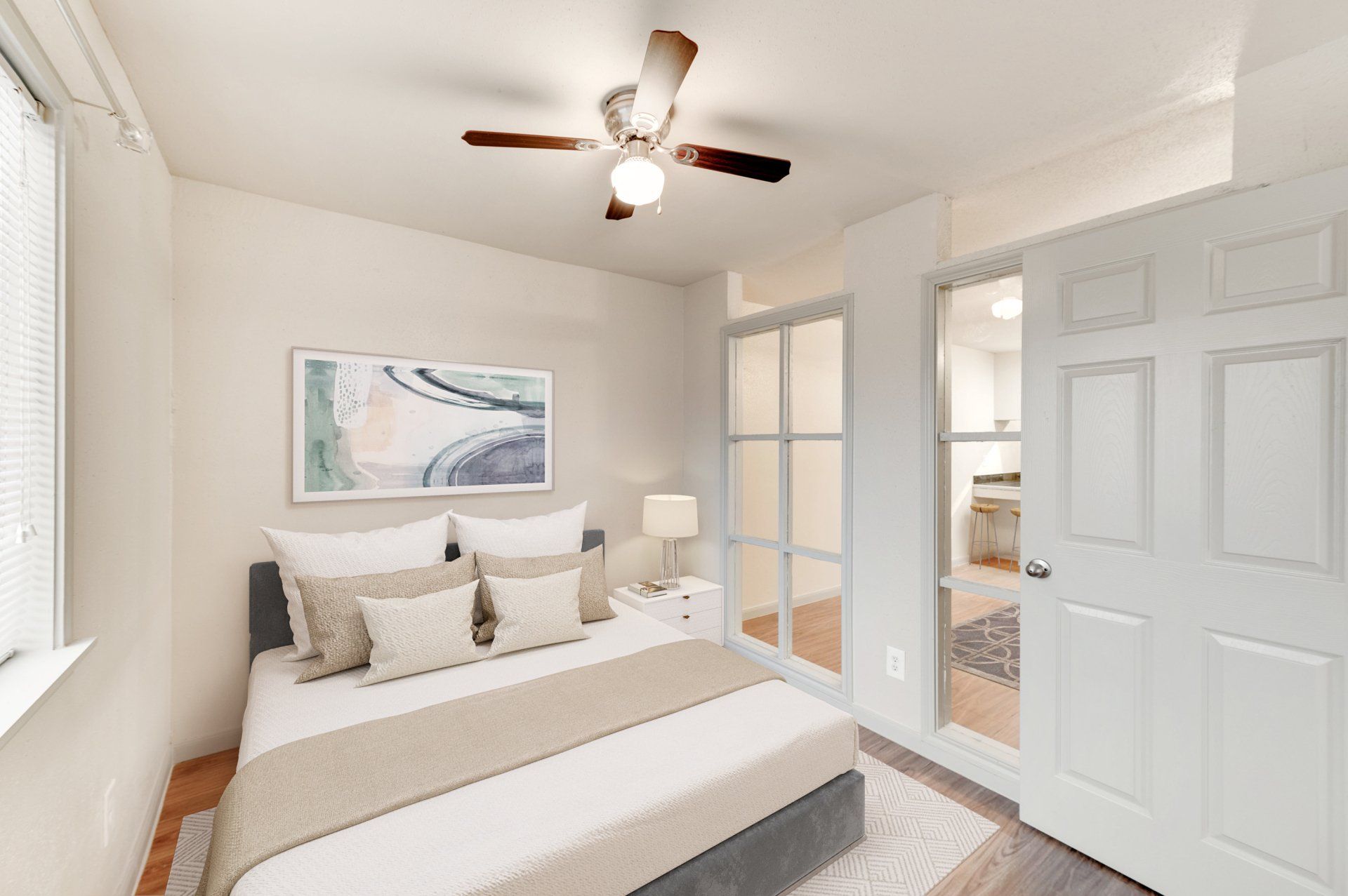 Modern bedroom at GIA Westchase with sliding glass door, perfect for Houston apartments.