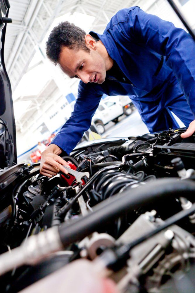 Man Fixing the Engine — Trusted Mechanic in Mid North Coast