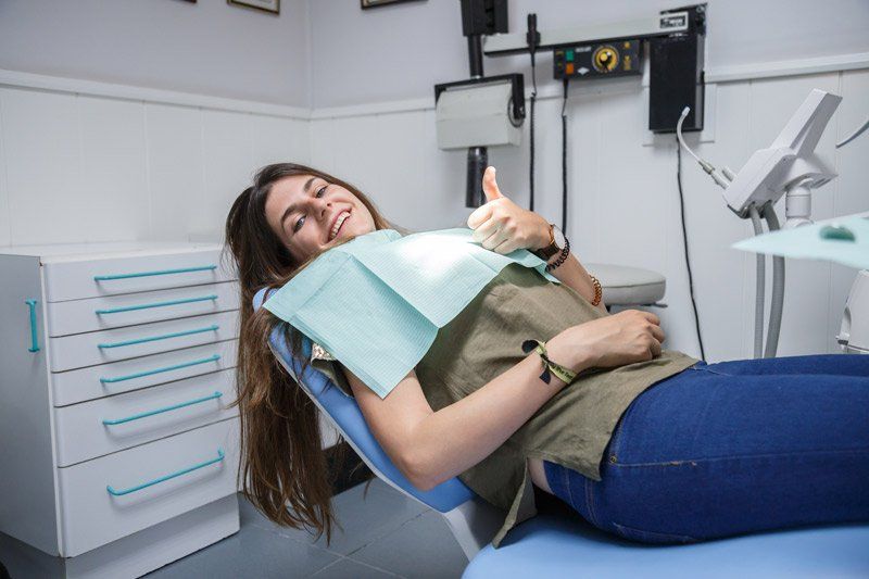 women in dentist chair