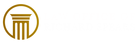 Gold pillar within a circle icon and the words Law Office of Richard Spears.