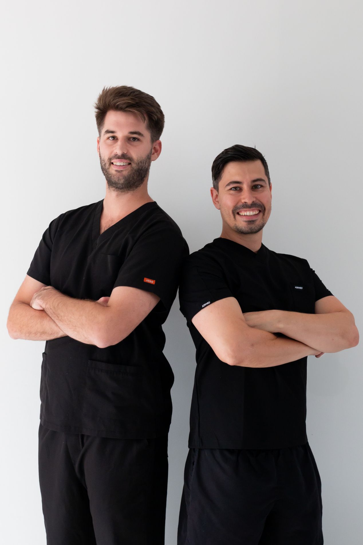 Dentist Shows a Patient a Partial Denture in an Office Setting — Dentures Direct Ballina In Ballina, NSW