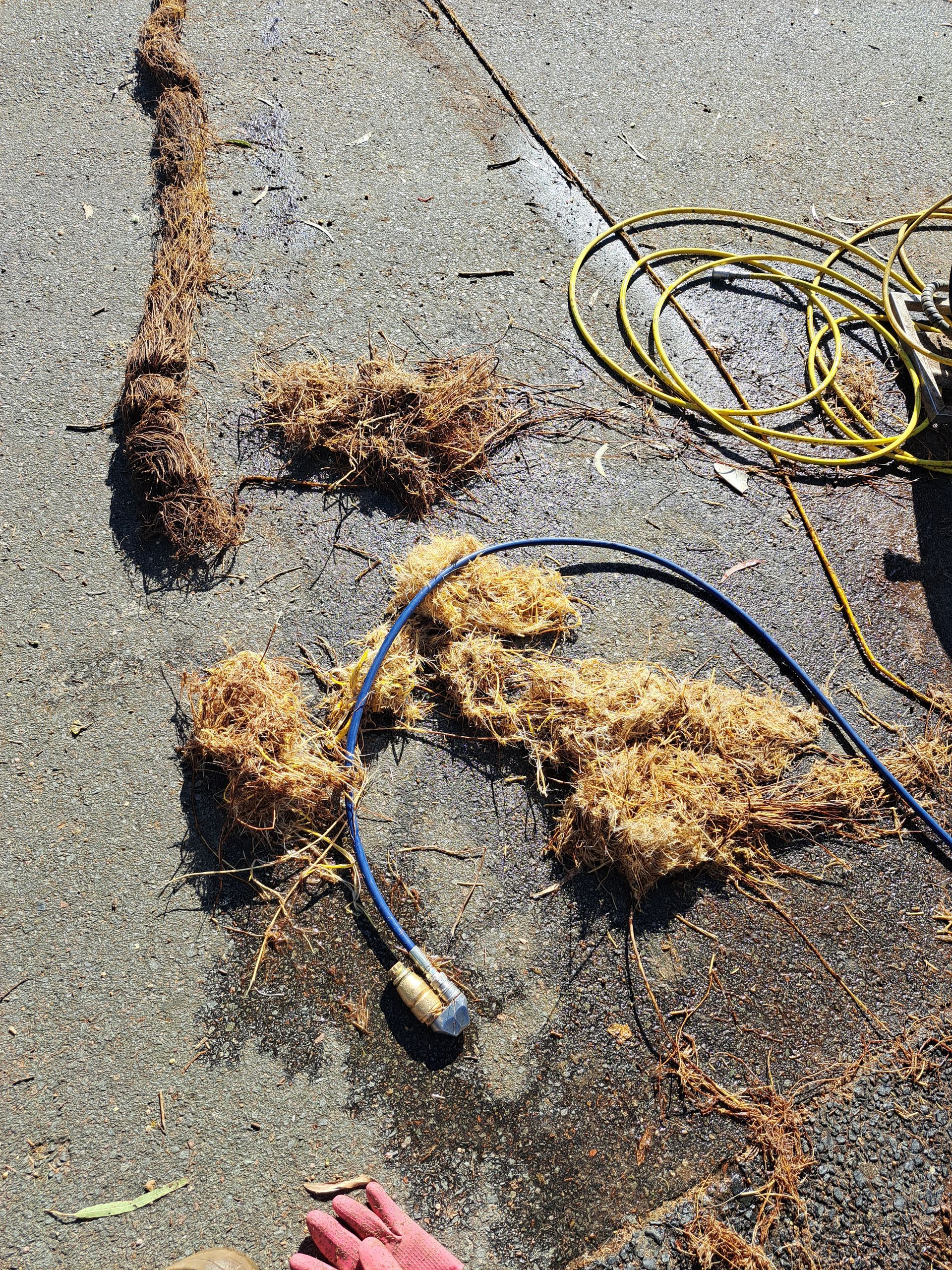 High pressure water jetting used to clean up a drain in a residence — All About Quality Plumbing Services In Halekulani, NSW