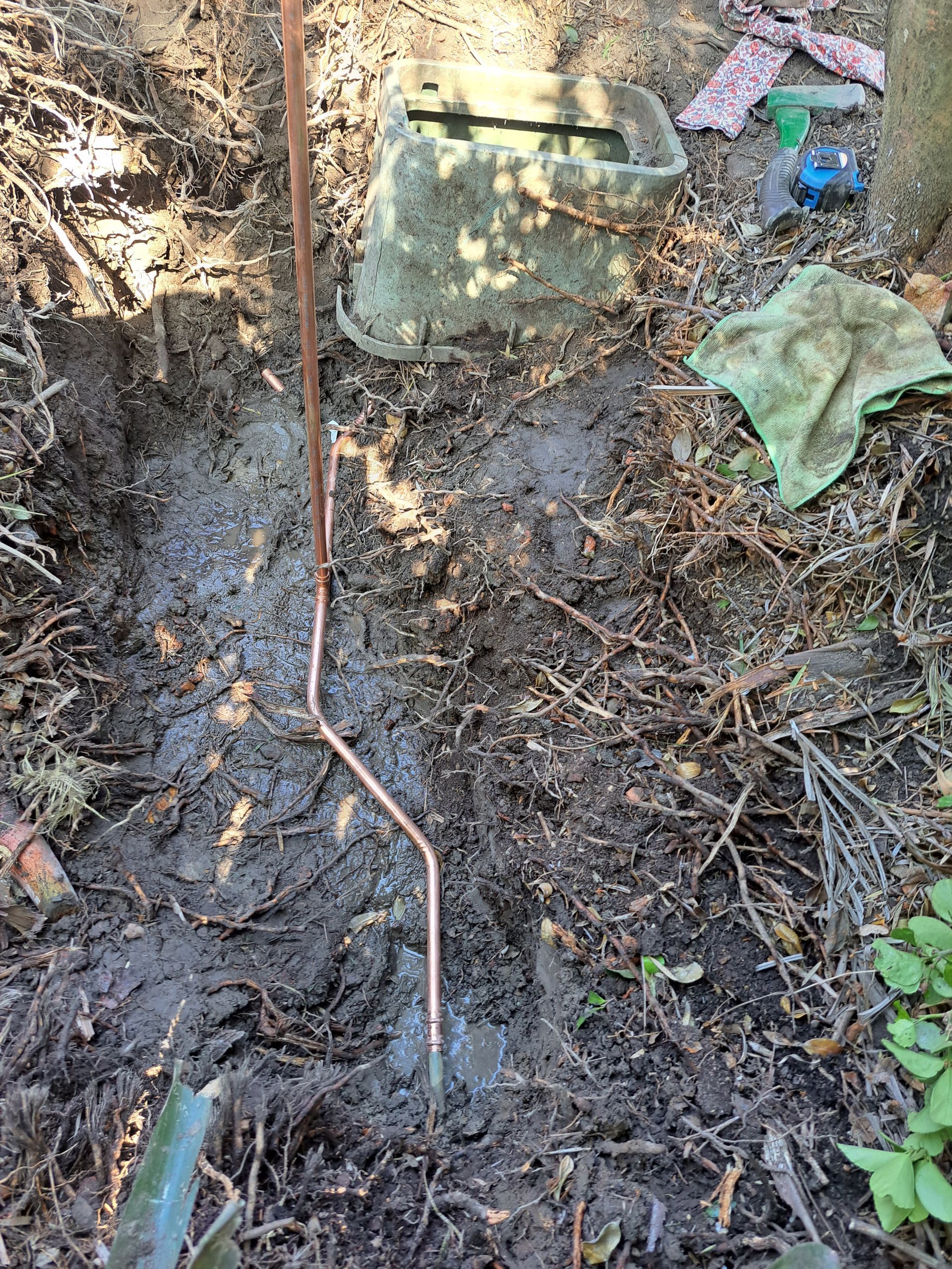 Burst pipe in a backyard — All About Quality Plumbing Services In Halekulani, NSW