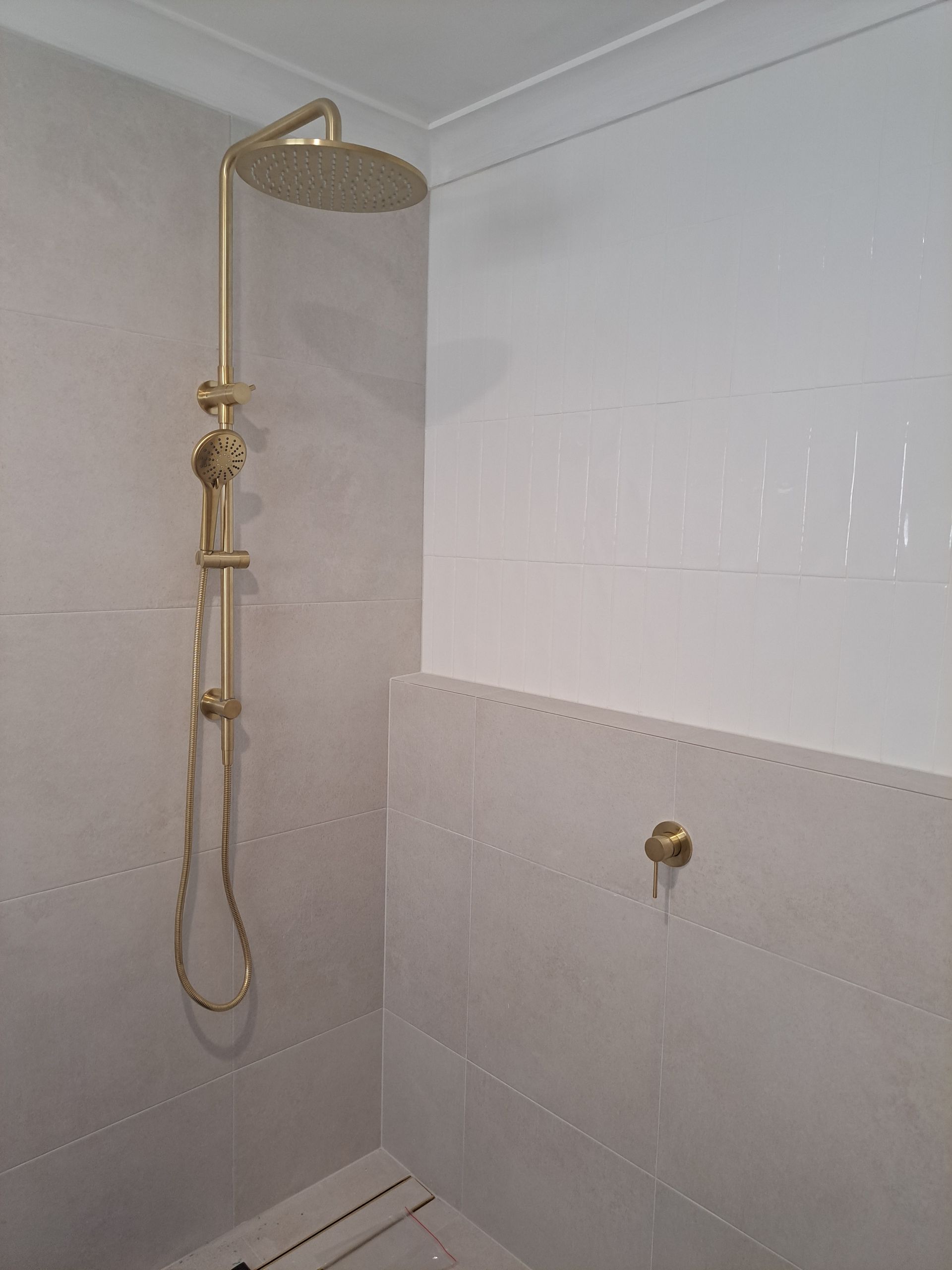 Shower head with hot water system— All About Quality Plumbing Services In Newcastle, NSW