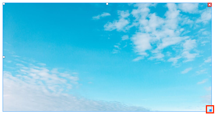 Blue sky with white puffy clouds.
