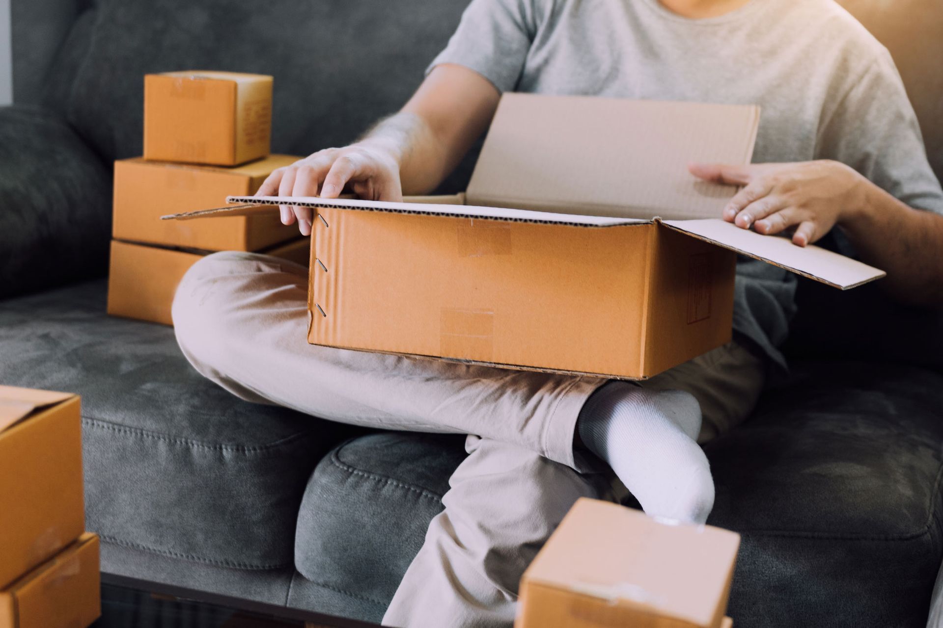 Entrepreneur Teenager Is Opening A Cardboard Box — TX — Longhorn Fairy Godmother Services