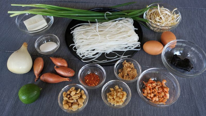 Ingredients for Thai Pad Thai, including fish sauce, palm sugar, tamarind, eggs, and chilies.