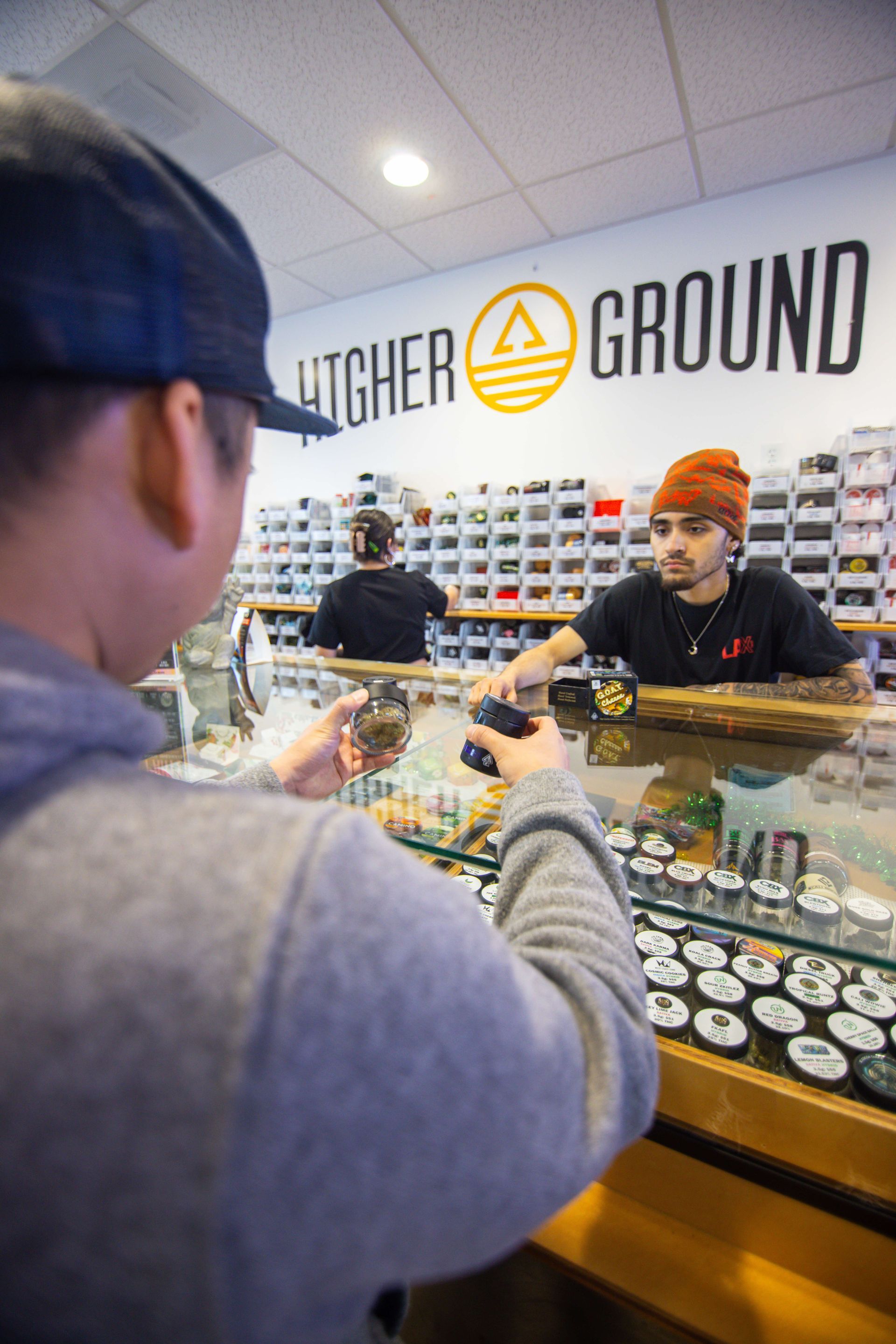 the inside of a store called higher ground