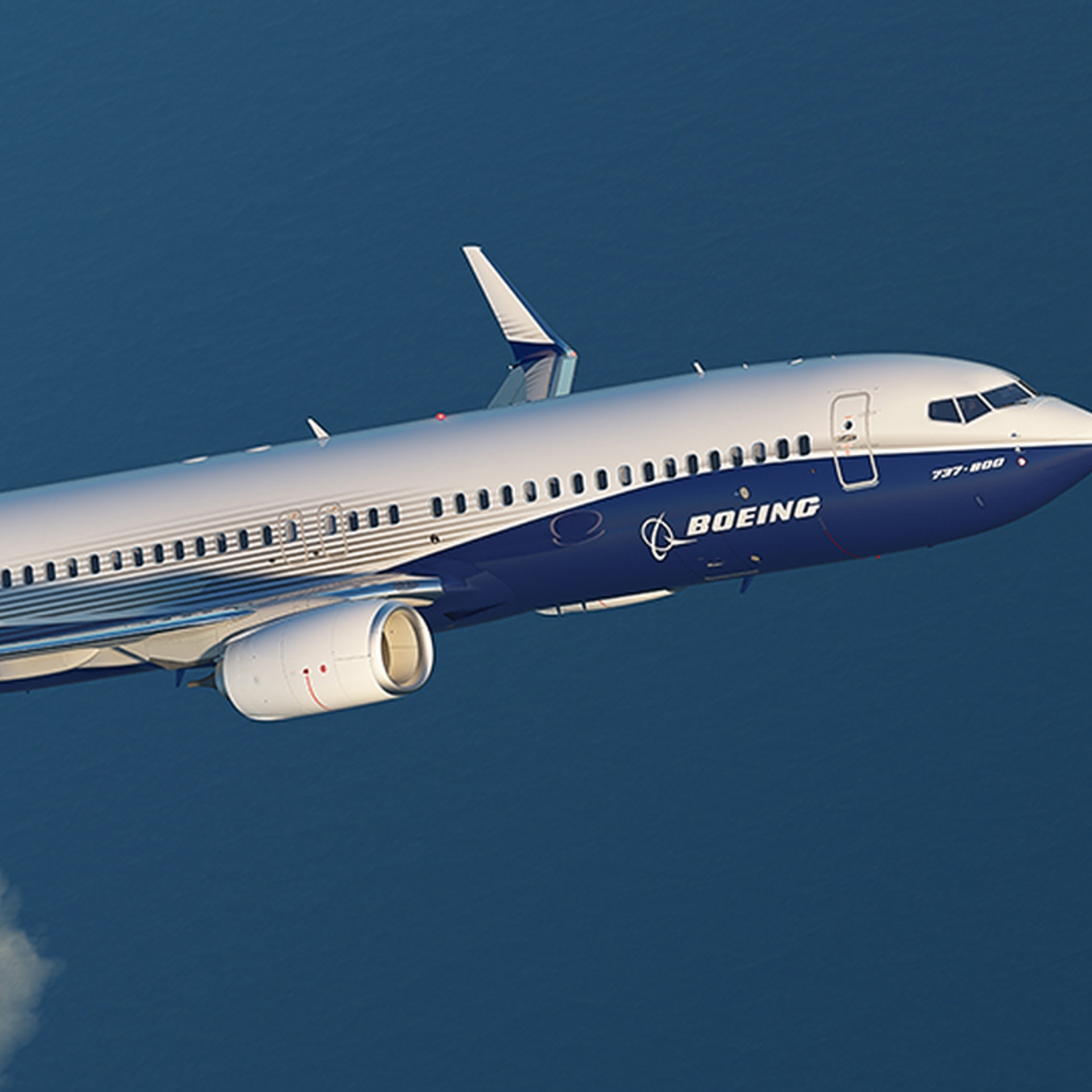 A boeing airplane is flying in the sky