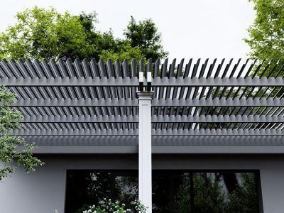 A pergola is sitting on top of a building next to a window.