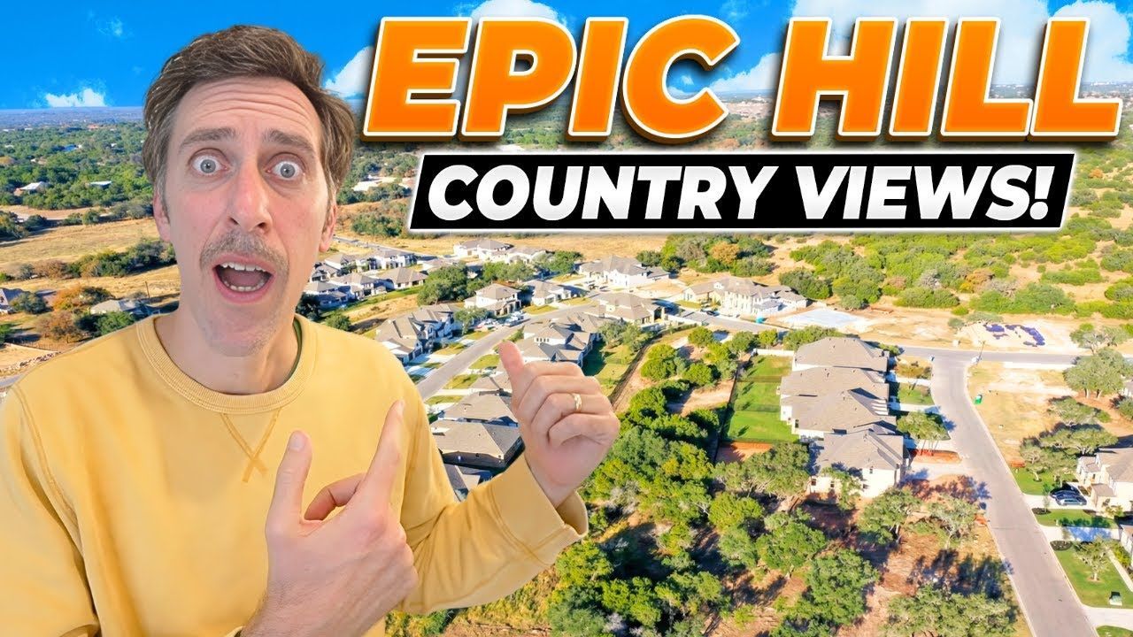 Man pointing at houses on a hill, text 