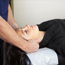 Person getting treated by a chiropractor