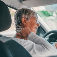 Person with Whiplash injury from an Auto Accident