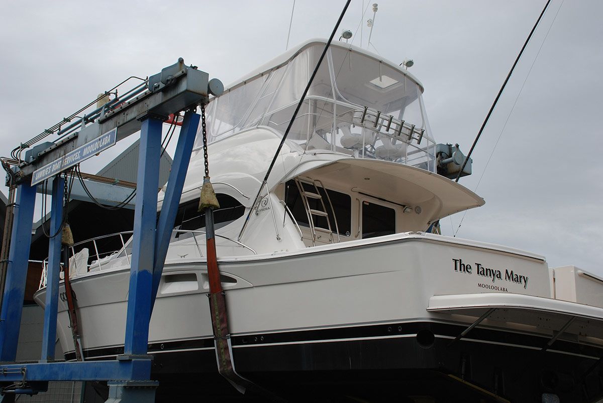 A White Boat with The Name the Tampa Man on The Side — Ashby Boat Builders In Buddina, QLD