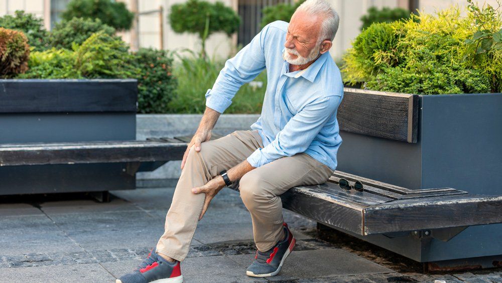 Senior Holding To The Legs — Fort Smith, AR — Arkansas Heart Center