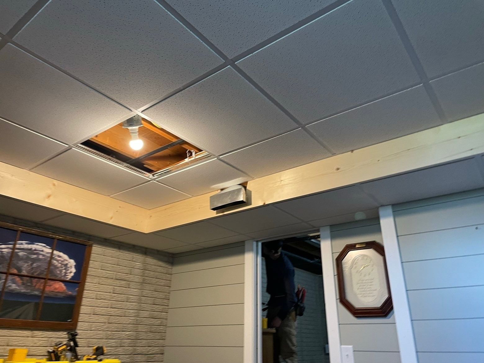 Detailed interior ceiling remodeling and lighting repair work in Lansing, Iowa.