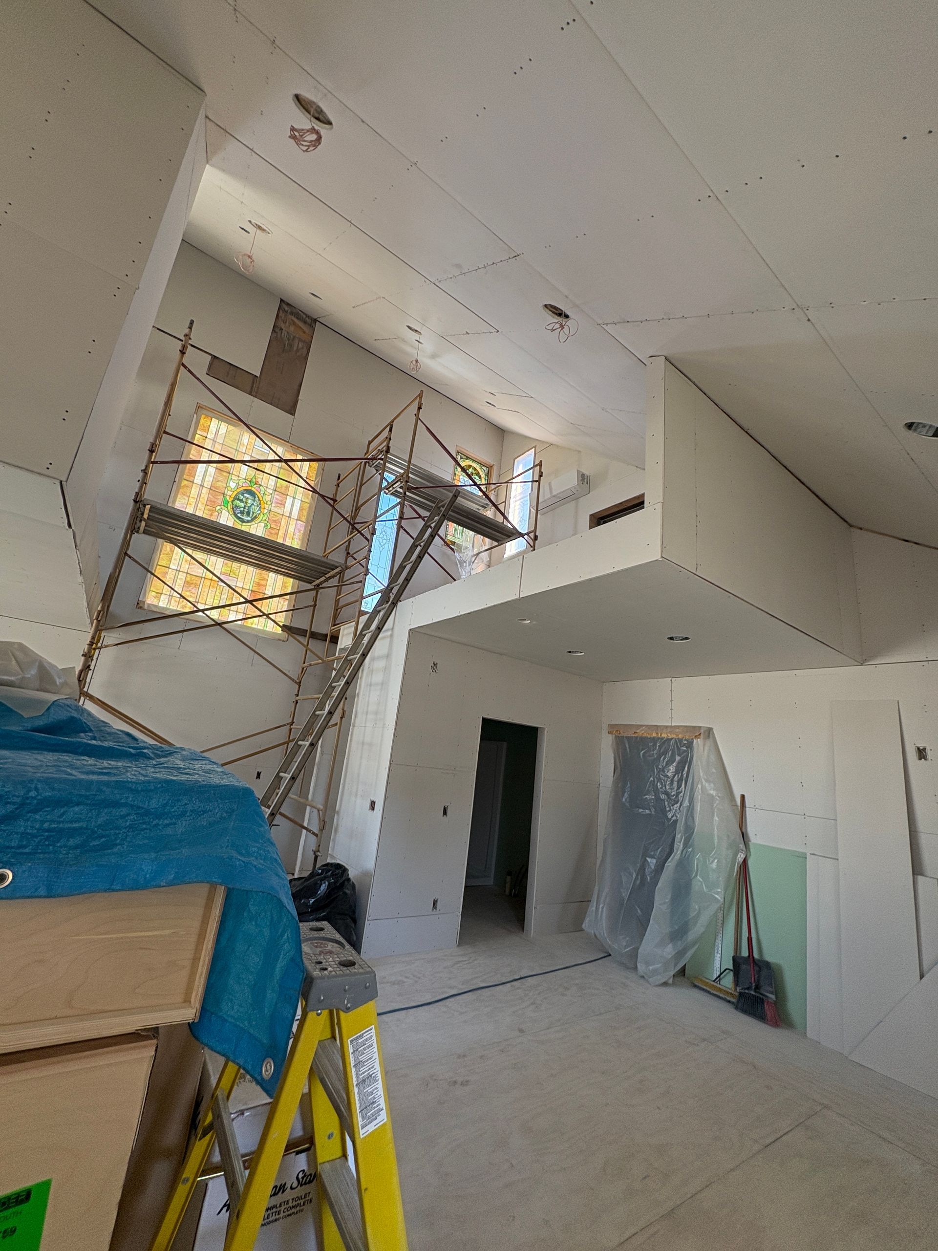 Detailed interior ceiling remodeling and lighting repair work in Lansing, Iowa.