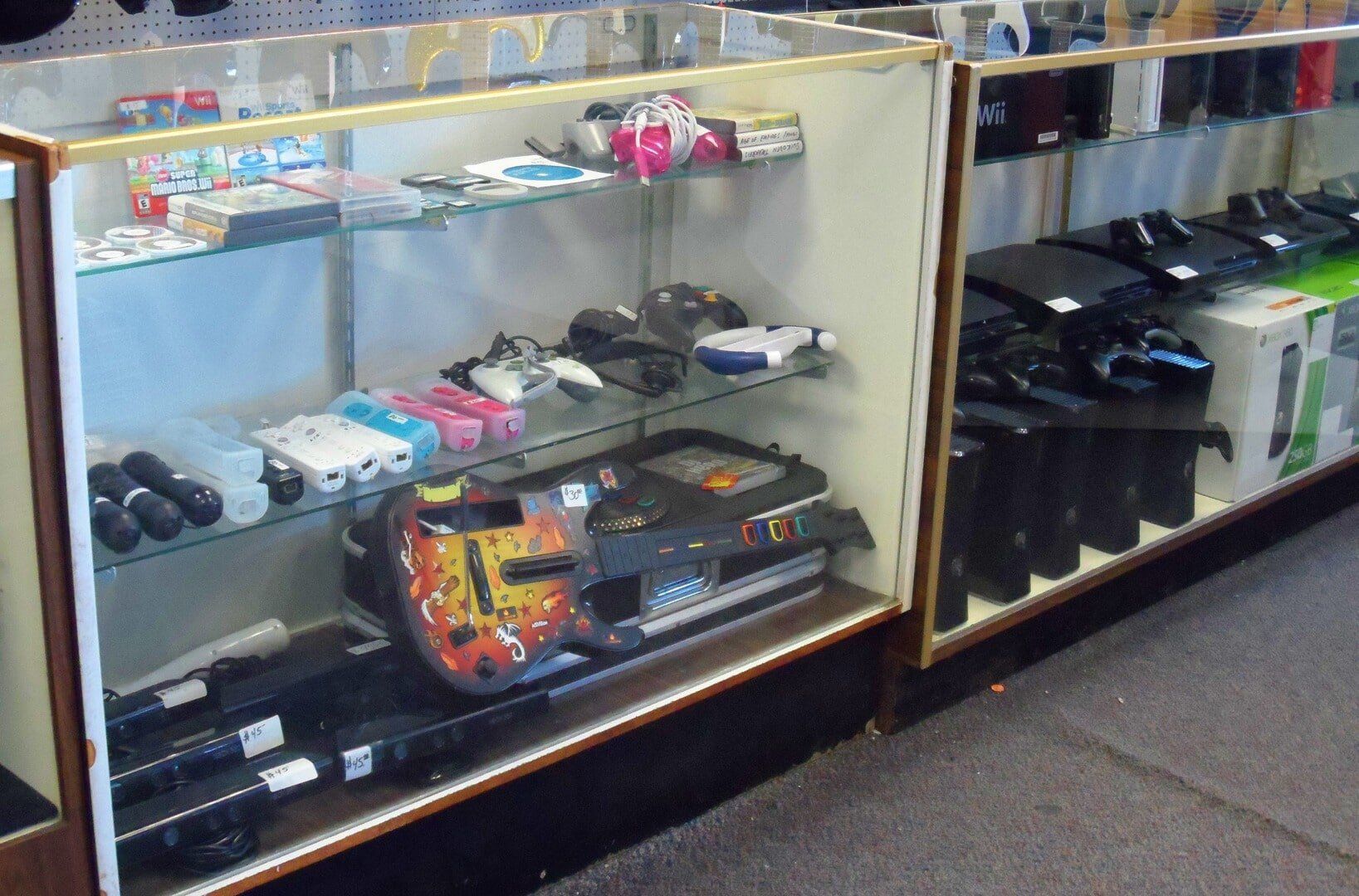 Shelf full of gaming materials - gaming systems in Victorville, CA