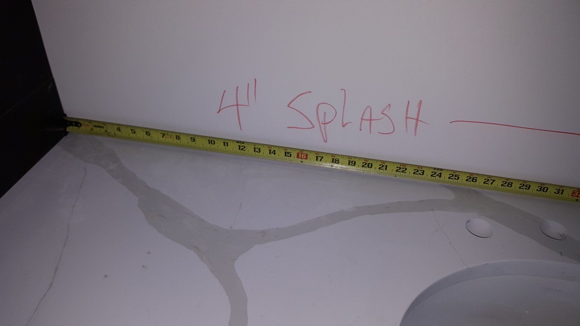 Bathroom Sink with Measuring Tape — Naples, FL — Rain Forest Marble Inc.