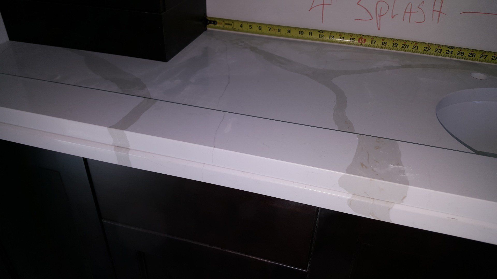 Tile Bathroom Sink with Measuring Tape — Naples, FL — Rain Forest Marble Inc.