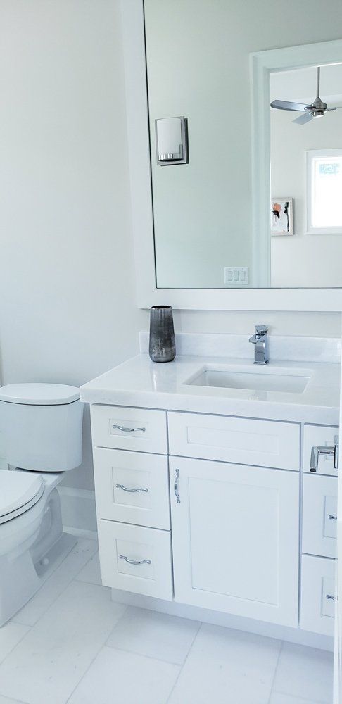 Bathroom Mirrors with Drawers and Toilet — Naples, FL — Rain Forest Marble Inc.