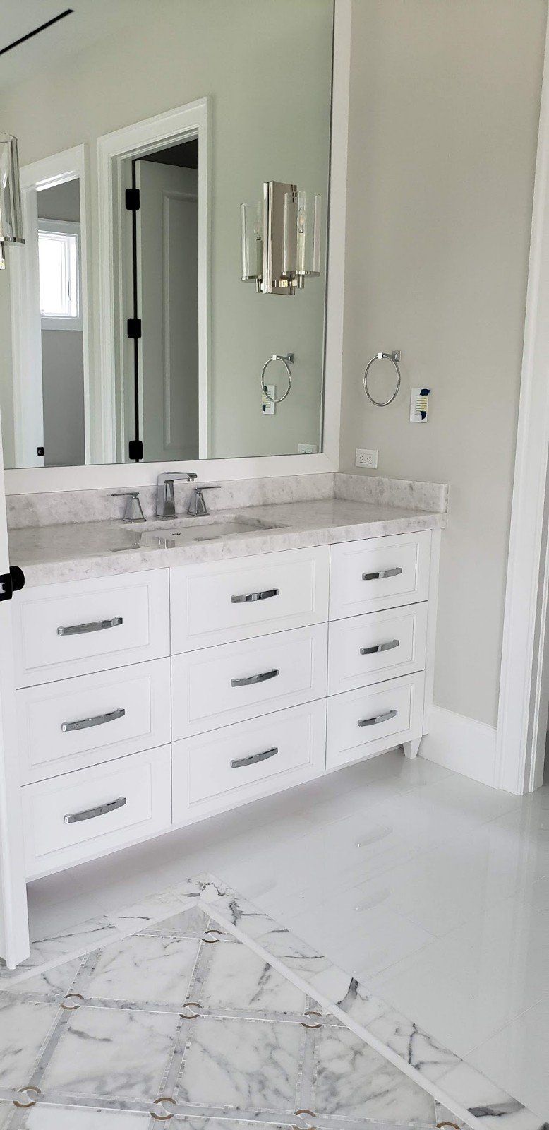 A Bathroom with Nine Drawer Cabinet — Naples, FL — Rain Forest Marble Inc.