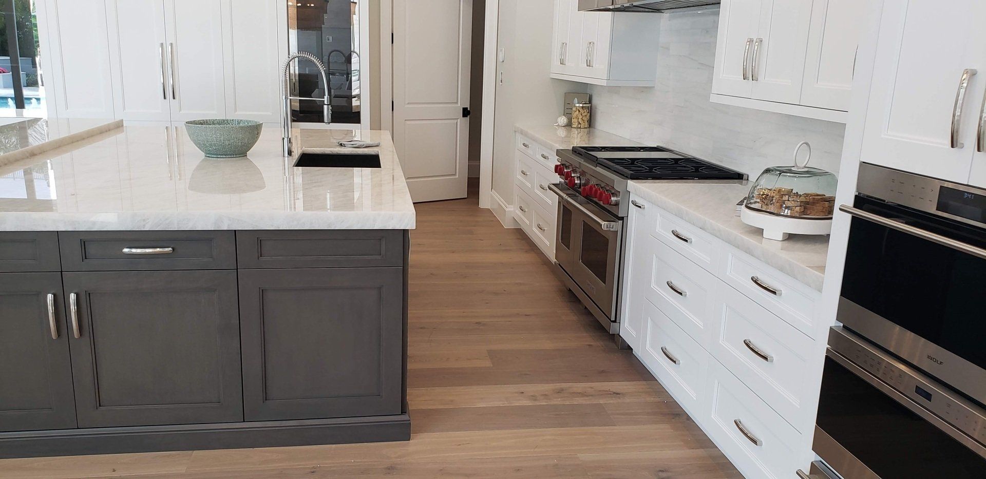 Kitchen with Island Counter — Naples, FL — Rain Forest Marble Inc.