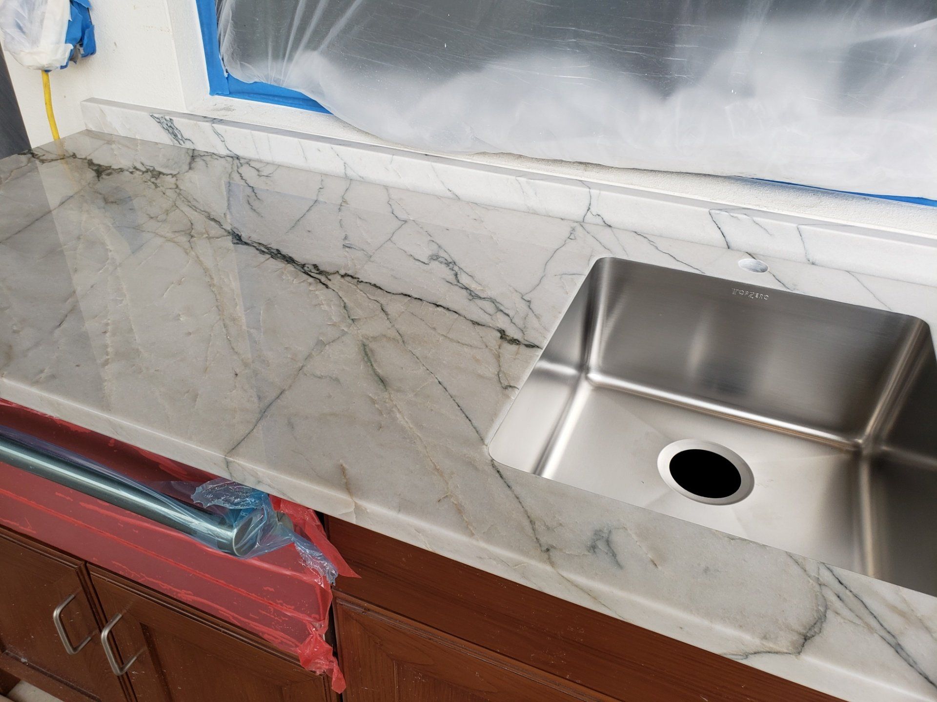 Single Sink On Countertop — St Naples, Florida — Rain Forest Marble Inc.