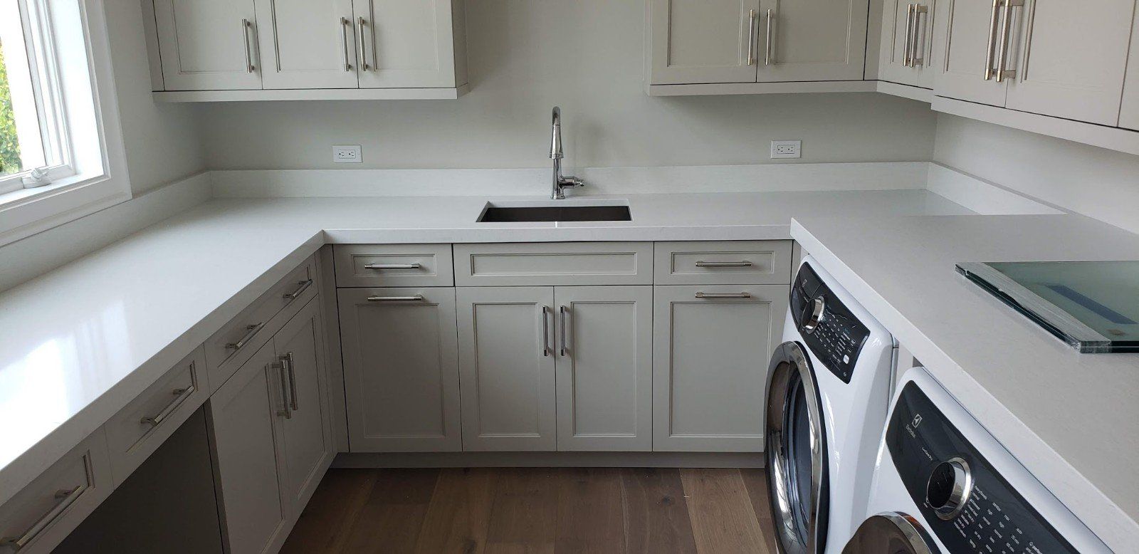 Beautiful White Kitchen in New Luxury Home — Naples, FL — Rain Forest Marble Inc.