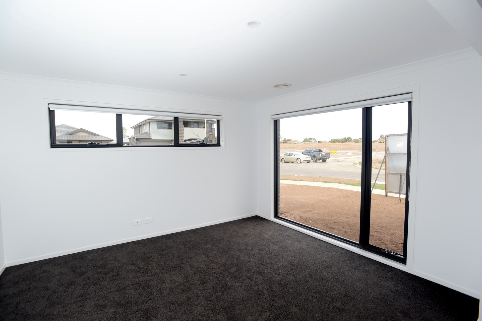 A Wooden Building With a Roof and a Covered Area in the Backyard — Evoke Building Group In Ballarat Central, VIC