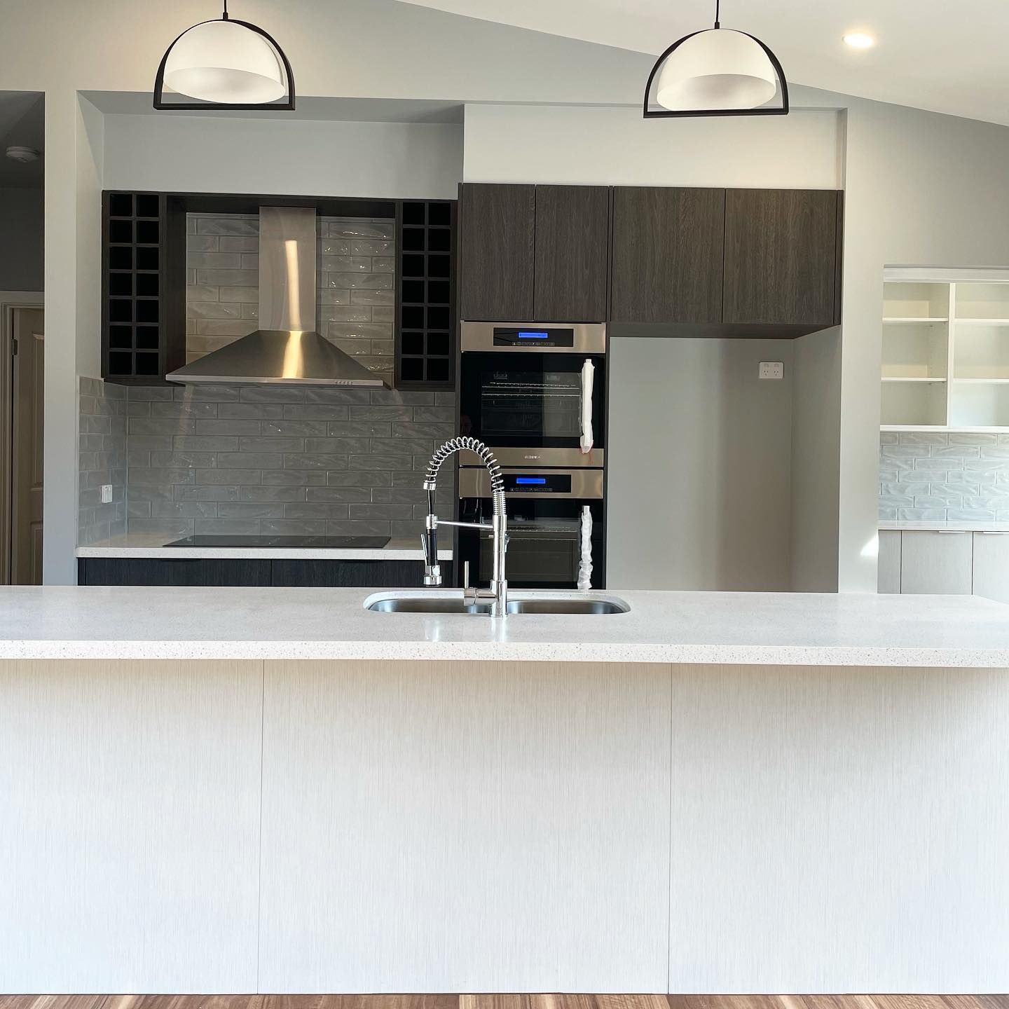 Kitchen with Stainless Steel Appliances and a Sink — Home Construction in Ballan, VIC