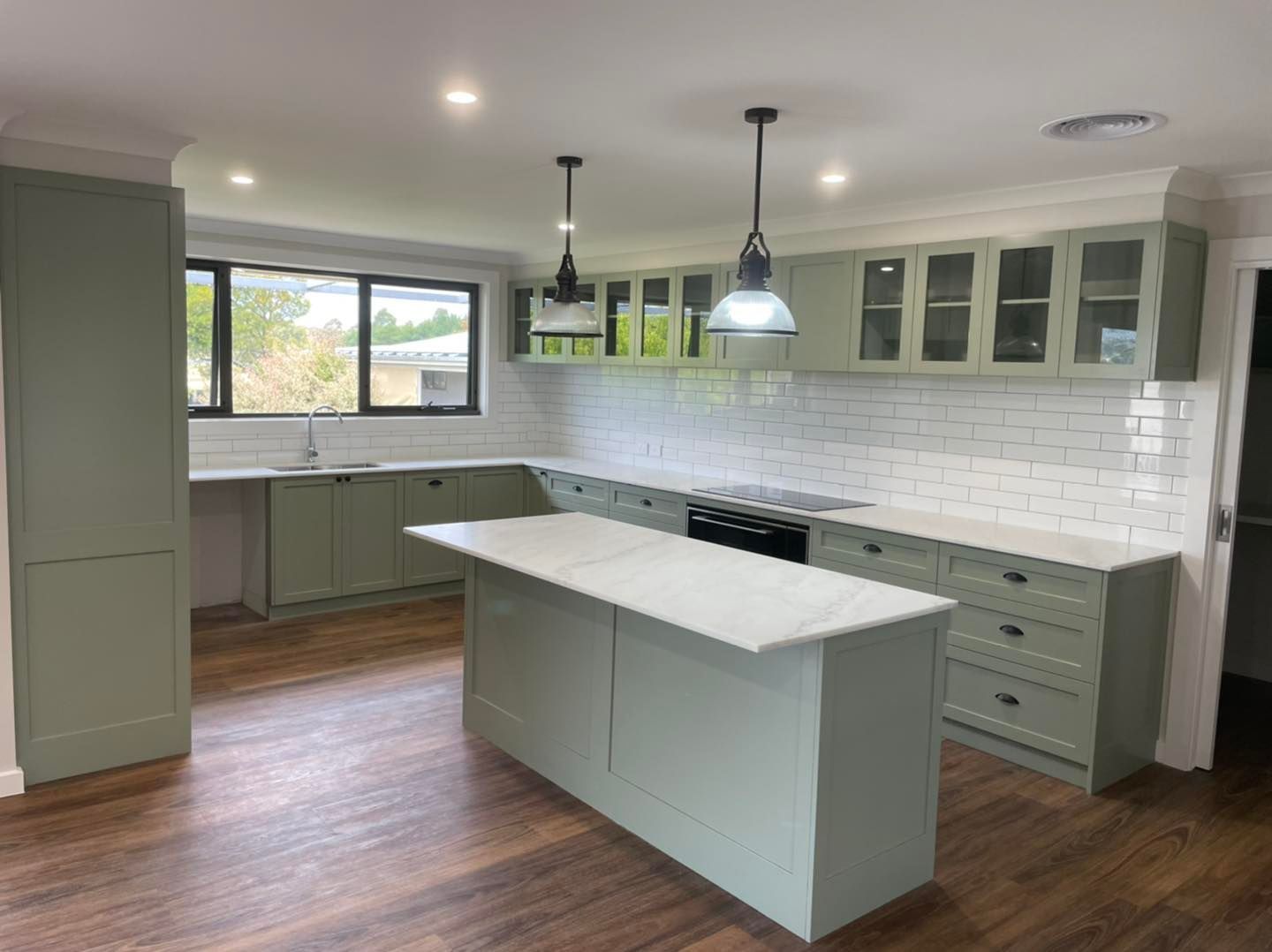 A Kitchen With a Large Island in the Middle of the Room — Evoke Building Group In Ballarat Central, VIC