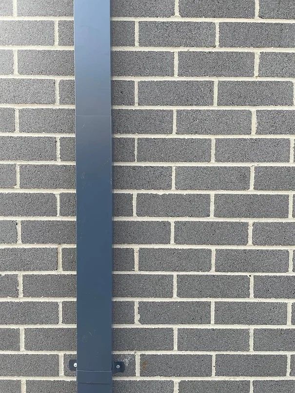 A Large White House With Solar Panels on the Roof — Evoke Building Group In Ballarat Central, VIC