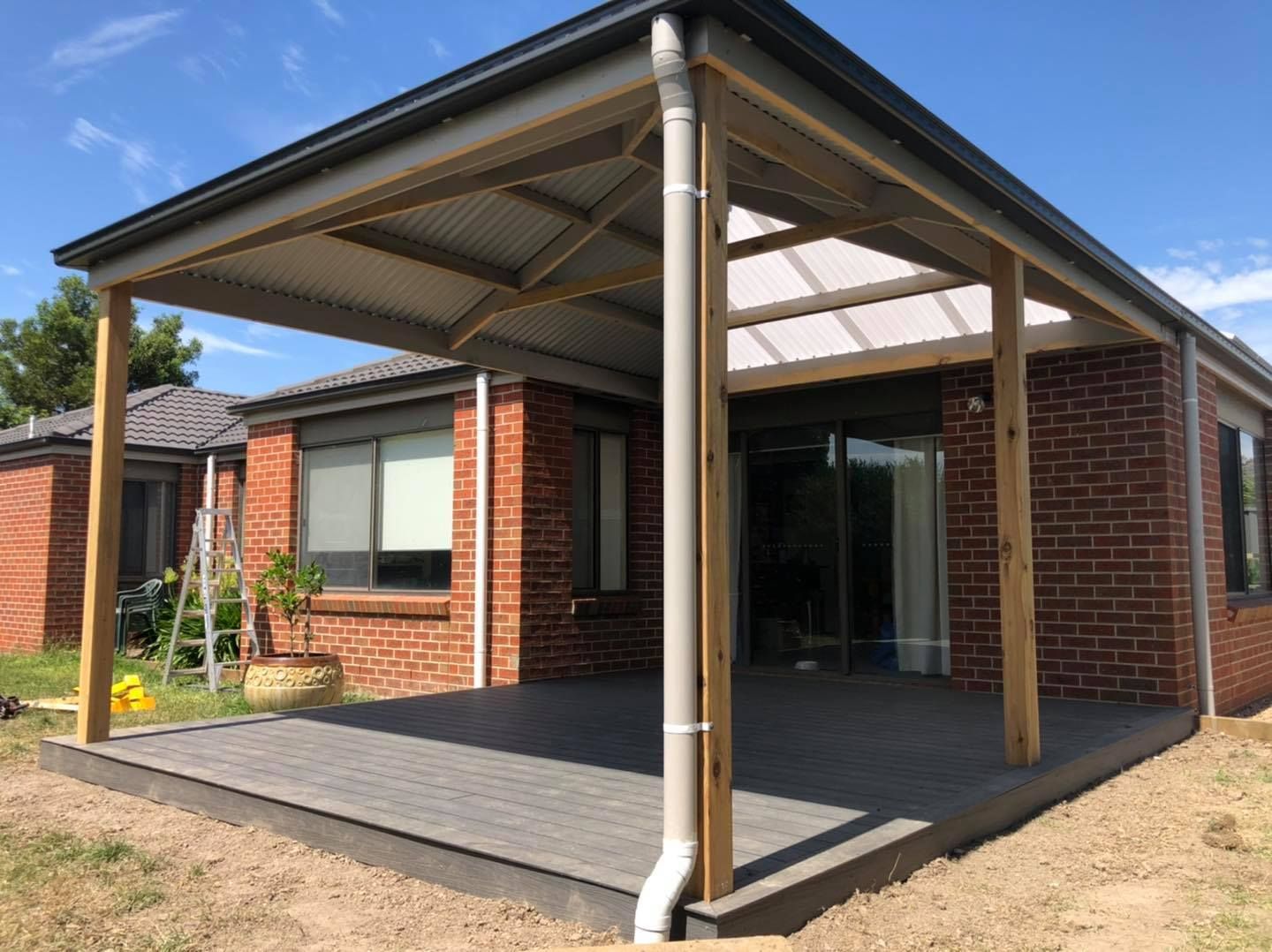 A Brick House With a Covered Patio in Front of It — Evoke Building Group In Ballarat Central, VIC