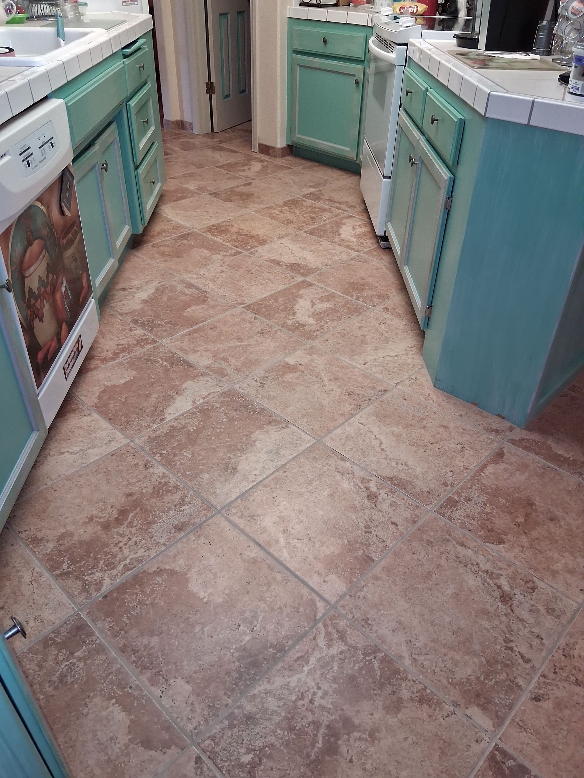 There is a corner bench in the shower.