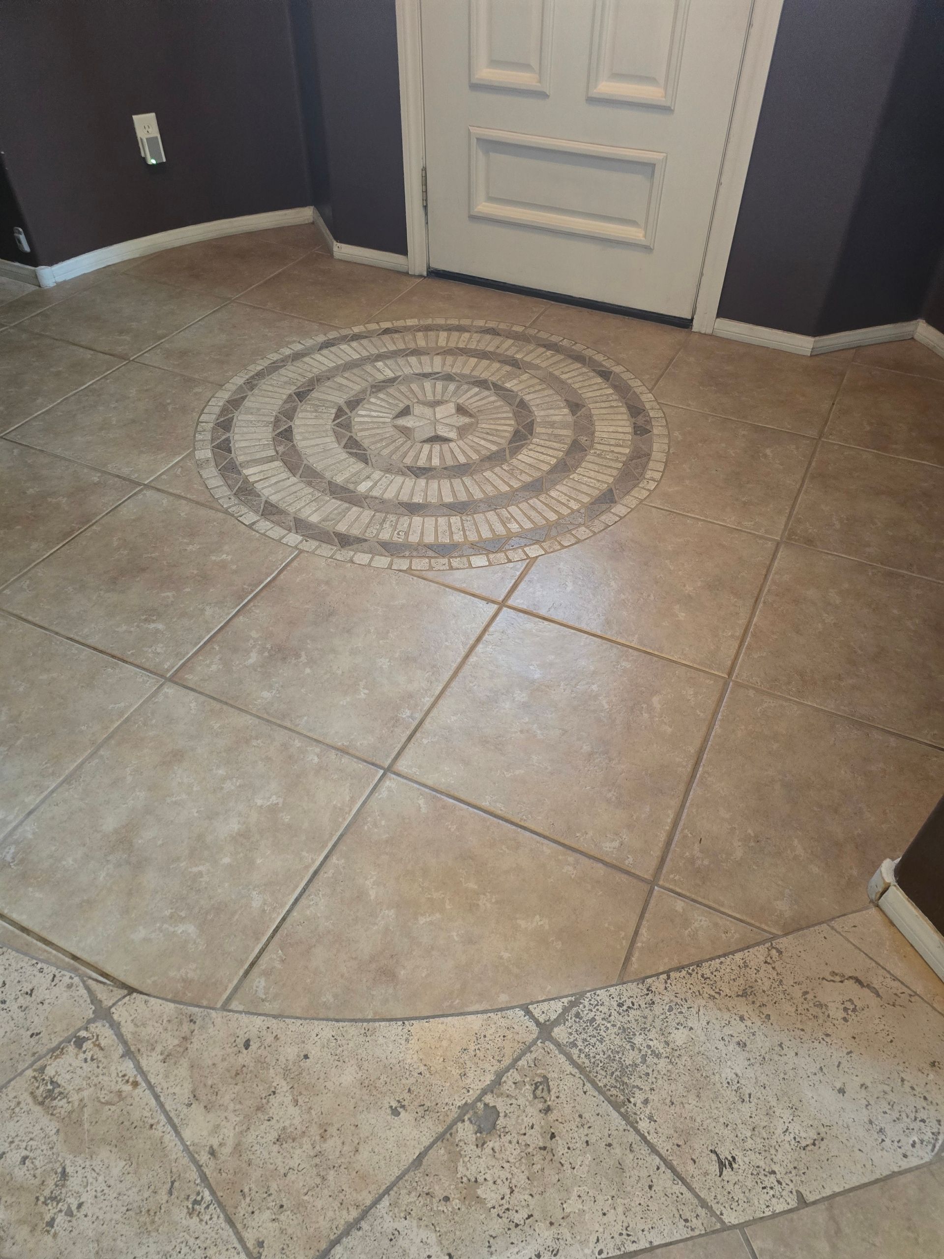A bathroom with a sink , toilet and mirror.