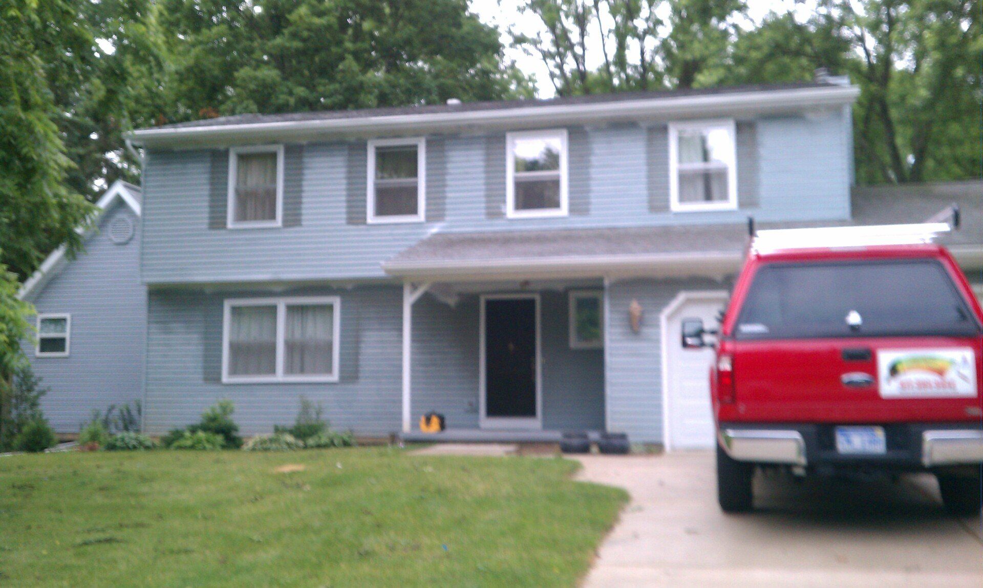 Before Painting the House Exterior — Okemos, MI — Tony Grant’s Painting Company