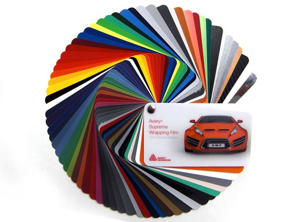 Color swatch fan with various hues, featuring an orange car illustration on a card.
