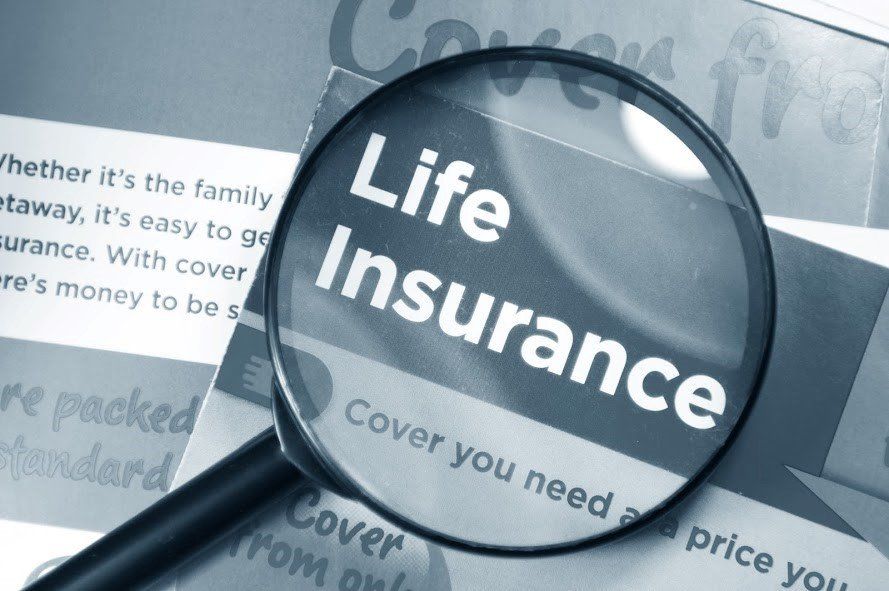 Life Insurance with Magnifying Glass — Chicago, IL — Illinois Insurance Center
