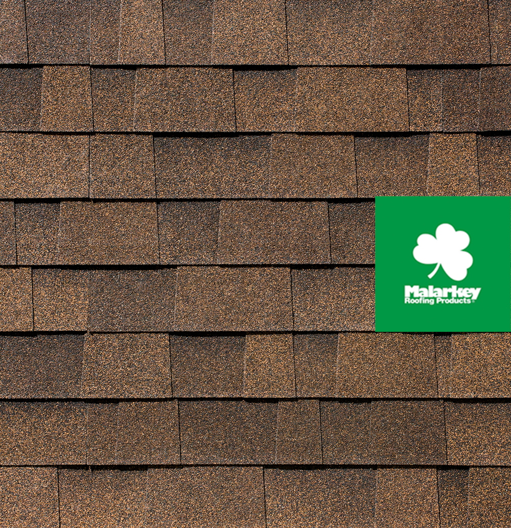 A close up of a roof with a clover on it