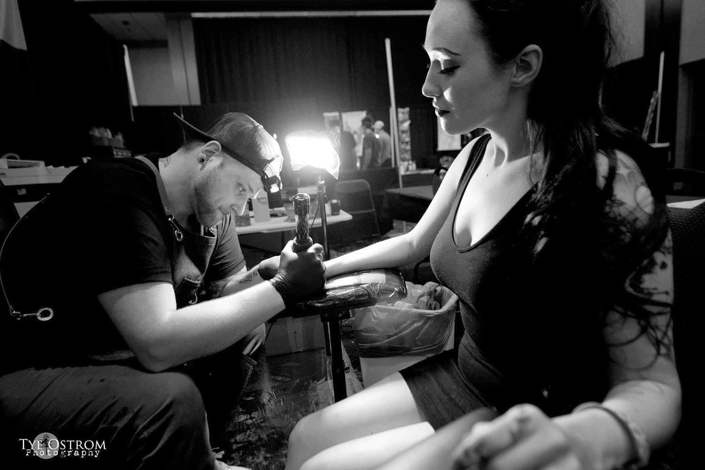 A Black and White Photo off  a Person Getting a Tattoo in Duluth, MN