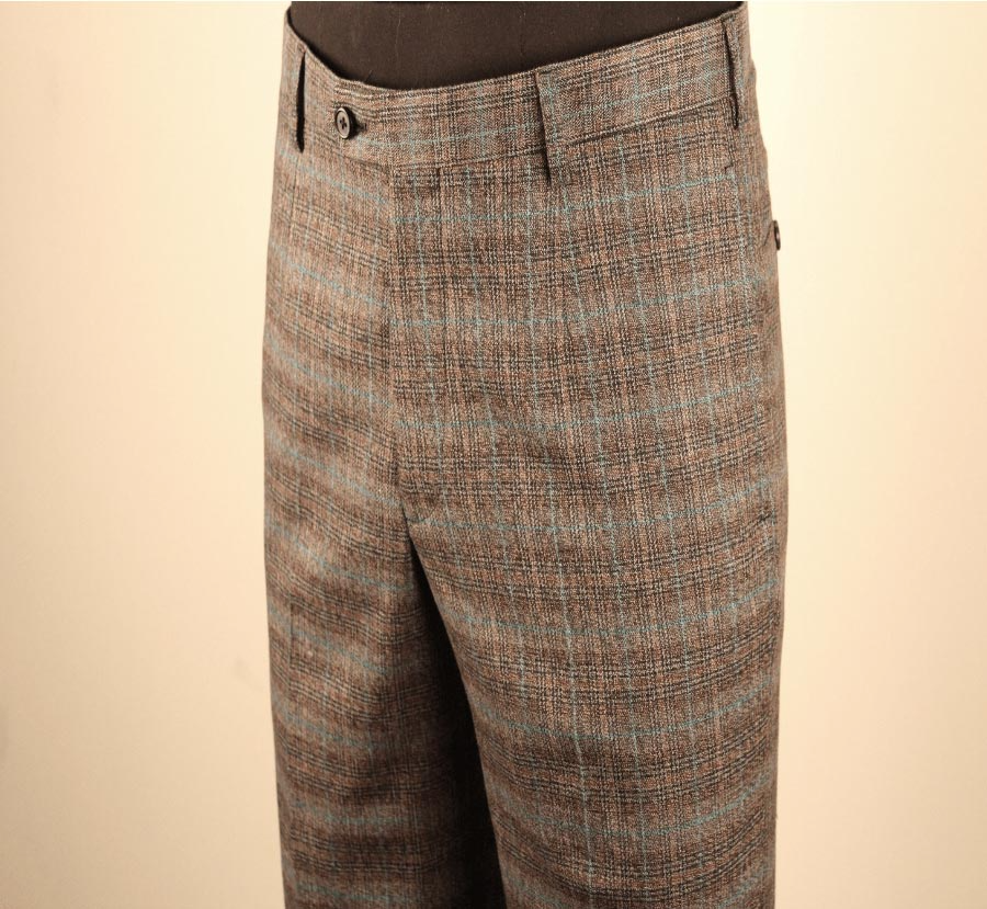 Close-up of brown patterned dress trousers on a mannequin waist