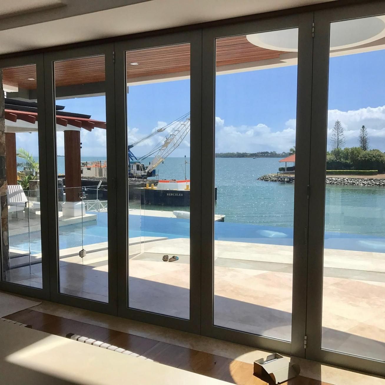 A View of A Body of Water Through a Window — Architectural Glass Solutions QLD in Cooroy, QLD
