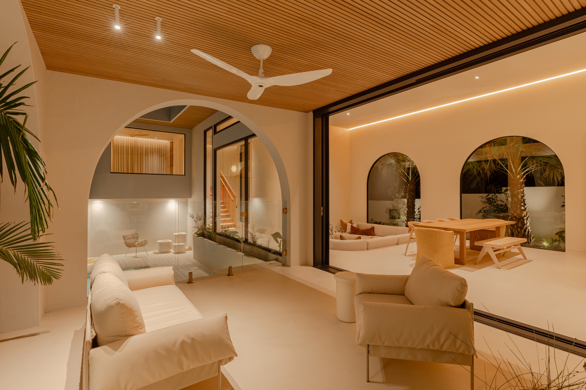 Interior of a Modern Open-concept Space With Doorways and Wooden Ceiling — Architectural Glass Solutions QLD in Cooroy, QLD