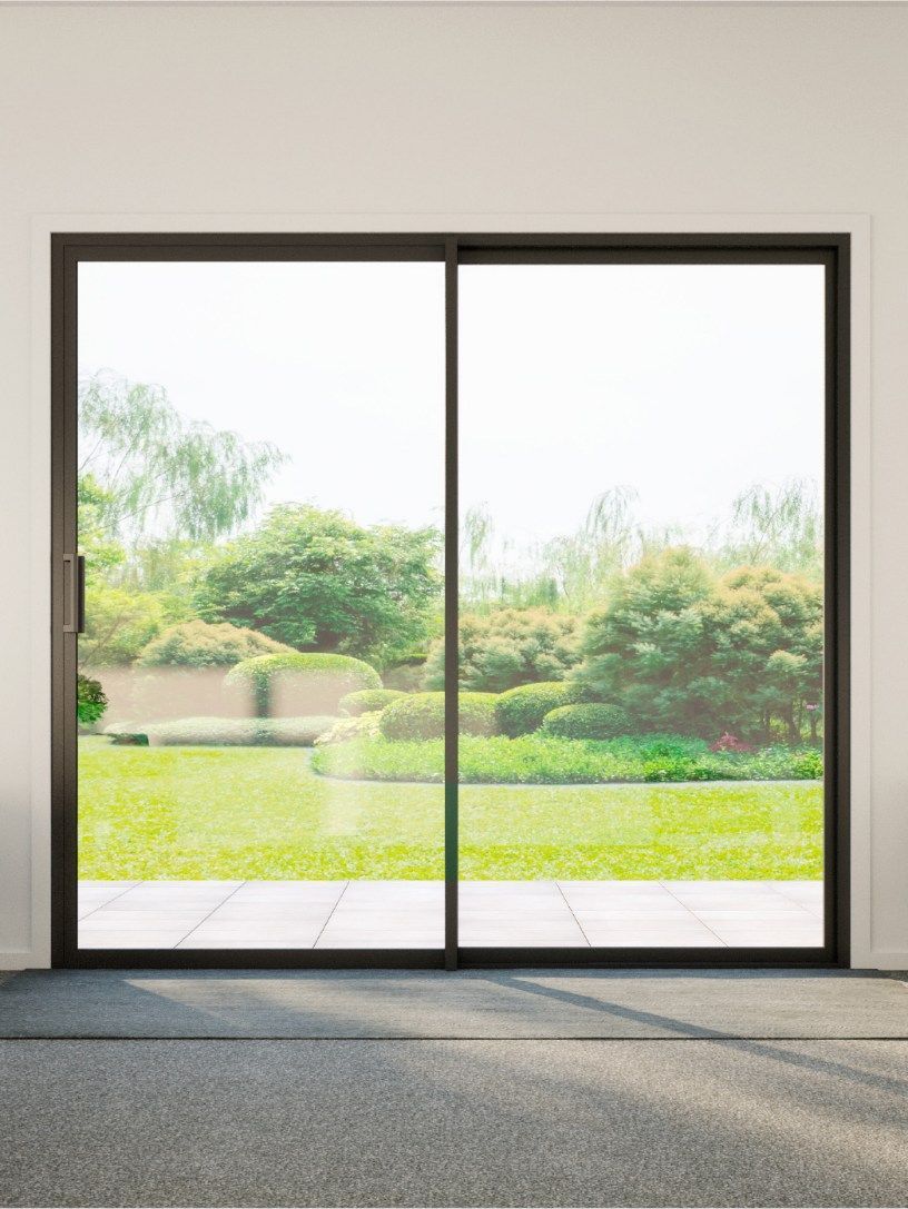 Sliding Glass Door With Dark Frame — Architectural Glass Solutions QLD in Cooroy, QLD