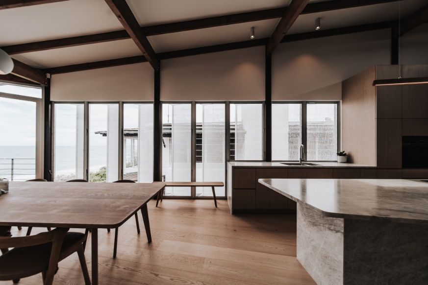 There is a Large Table in the Middle of the Room With a Lot of Windows — Architectural Glass Solutions QLD in Cooroy, QLD